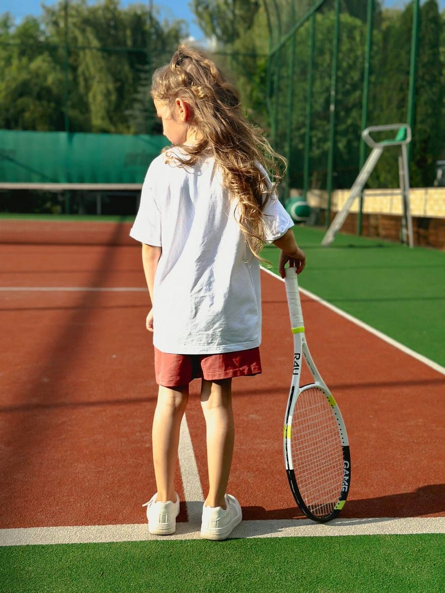 A child playing tennis